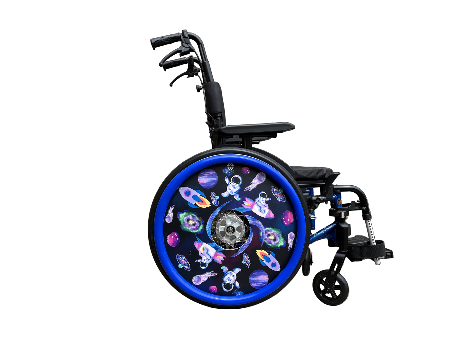 Wheelchair with cartoon space-themed wheel cover design featuring astronauts, rockets, and planets on a white background