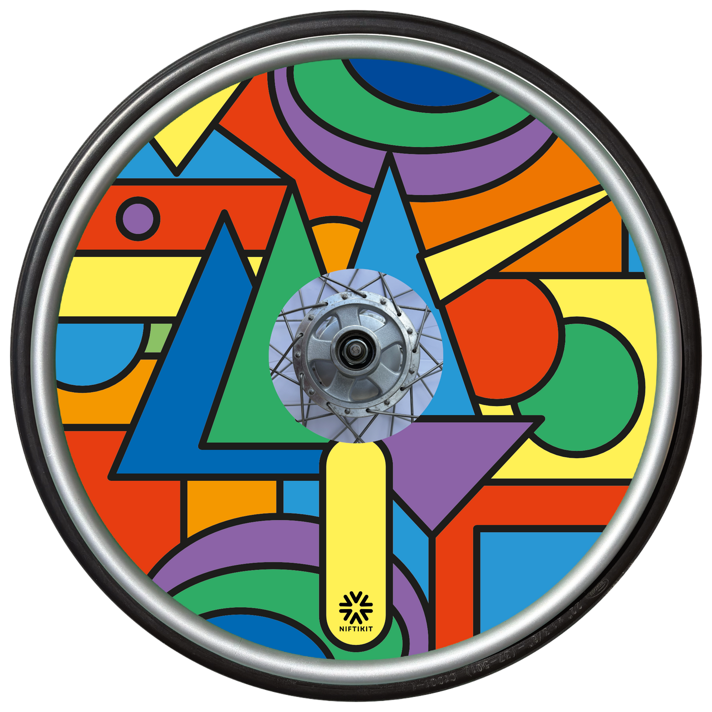 Wheelchair wheel with colorful bold geometric shapes spoke guard cover in bright colours. Small black Niftikit logo.