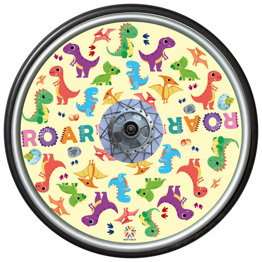 Wheelchair wheel featuring a wheel cover with colorful dinosaur pattern on a cream background