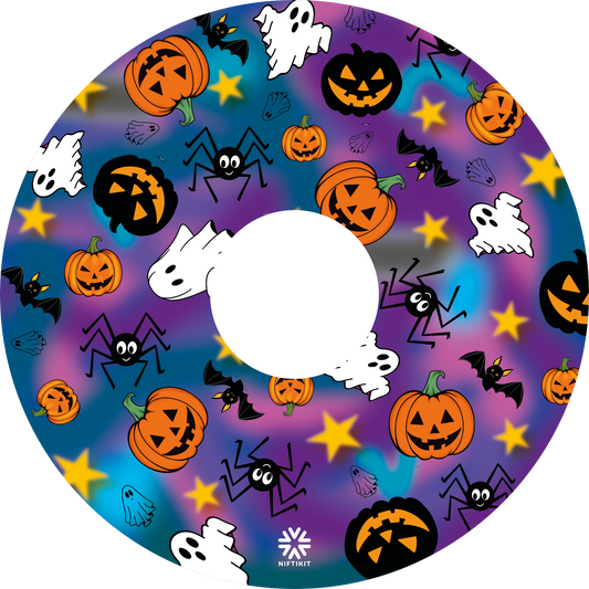 Wheelchair wheel cover featuring spiders, ghosts, pumpkins and bats on a blue and purple background.