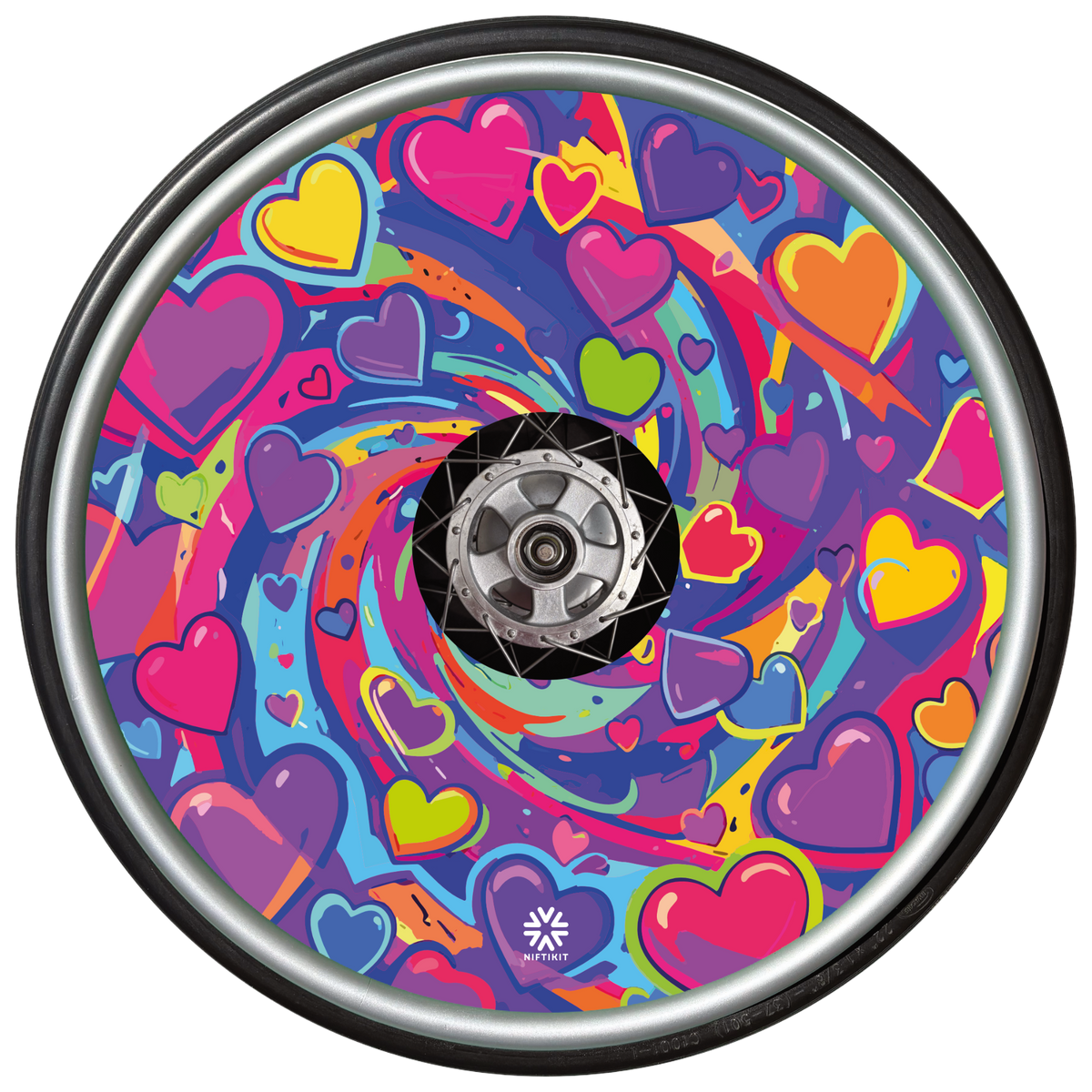 A bright love heart themed swirling design in pinks, purples, yellows and greens. This wheel cover is shown on a wheelchair wheel and includes a small white Niftikit Logo at the bottom