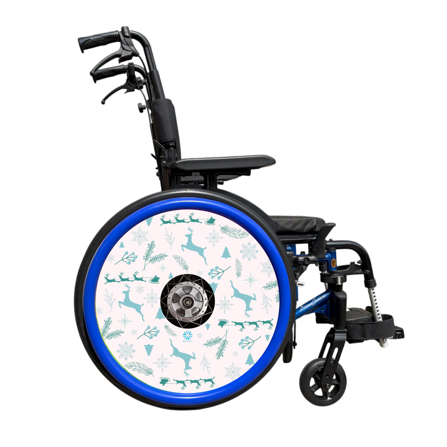 Wheelchair wheel with winter-themed pattern on a white background finished with a blue silicone hand rim cover.