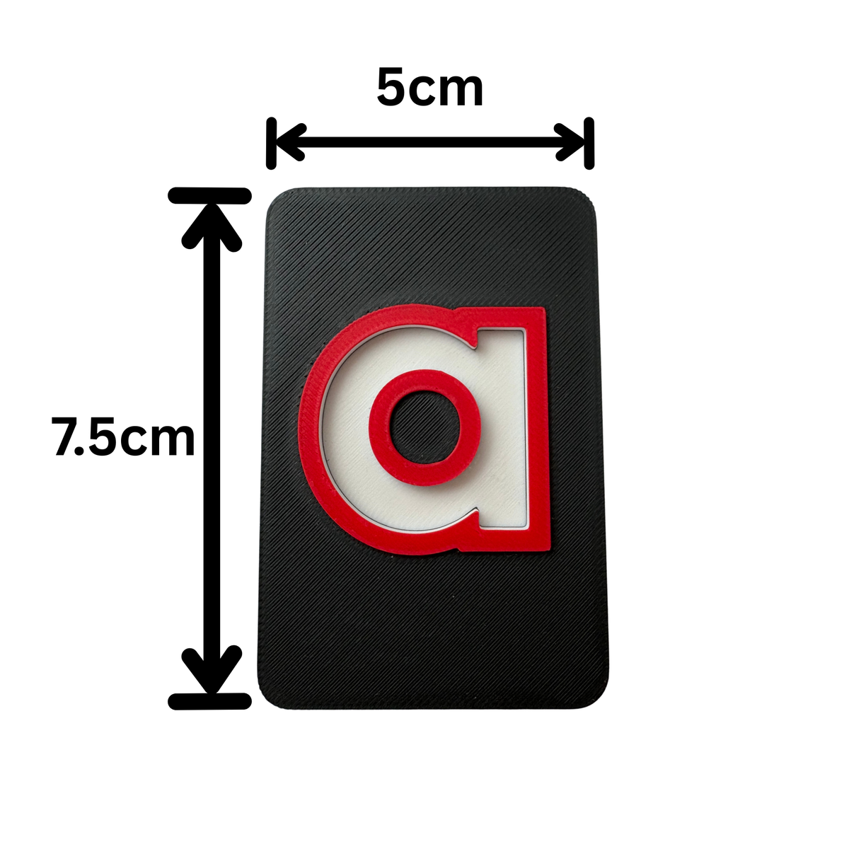 Black rectangular 3D letter tile with a red and white letter 'a' on a white background, showing dimensions.