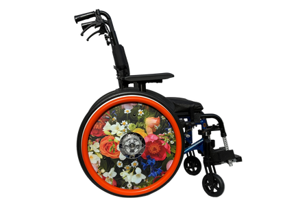 Wheelchair with spoke guard  featuring colourful finished with a bright orange silicone hand rim cover for grip and comfort.