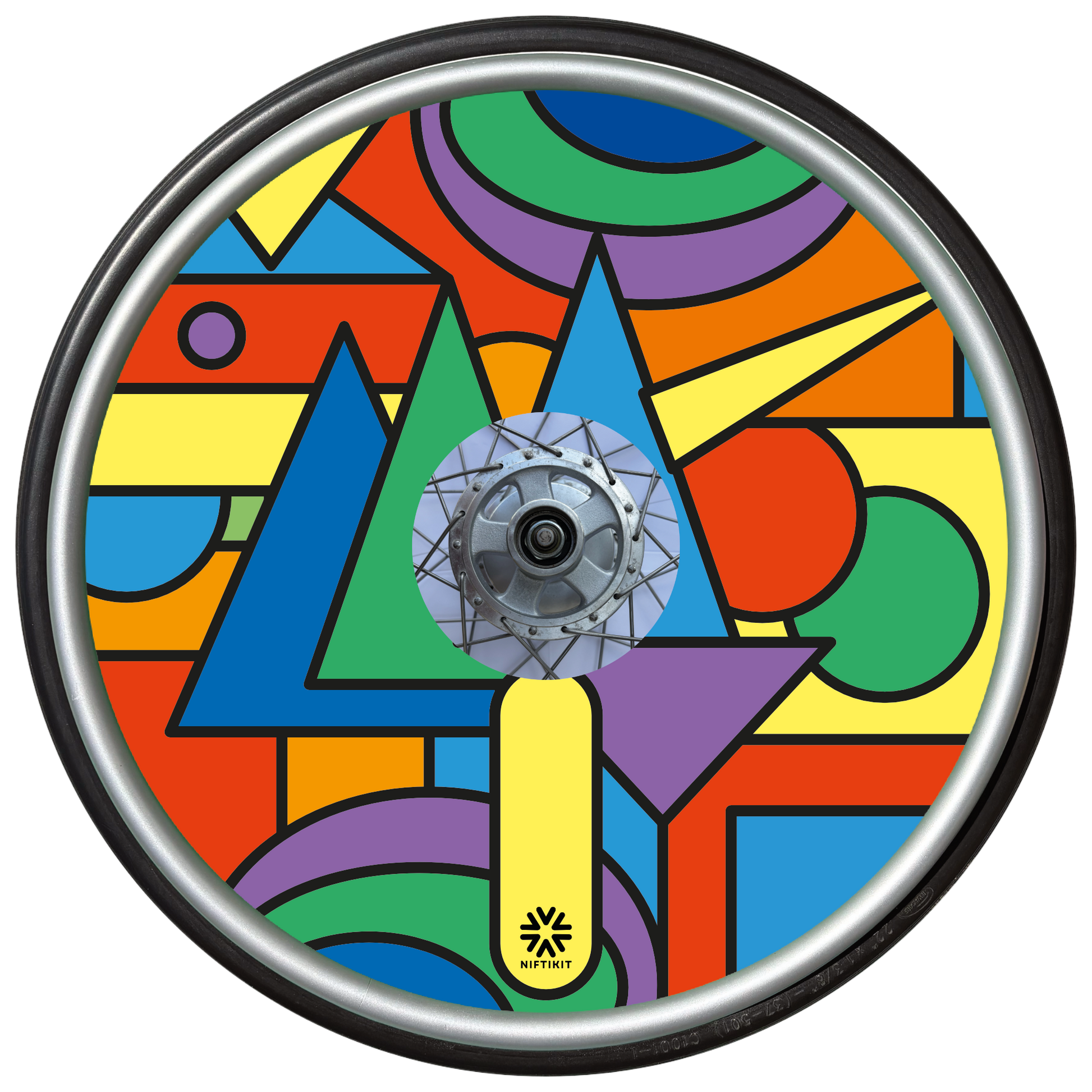 Wheelchair wheel with colorful bold geometric shapes spoke guard cover in bright colours. Small black Niftikit logo.