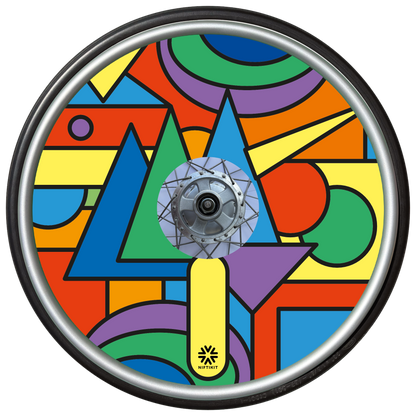 Wheelchair wheel with colorful bold geometric shapes spoke guard cover in bright colours. Small black Niftikit logo.