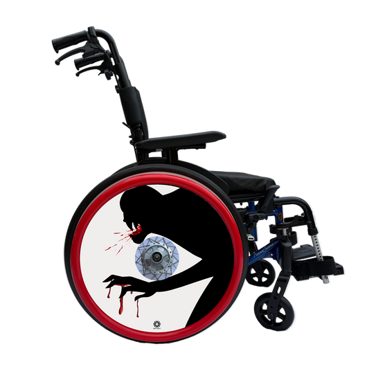 Wheelchair wheel cover on a wheel with red pushrim covers, featuring the silhouette of a monster with blood on mouth and hands on a  white background. 