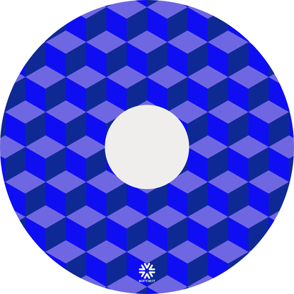 Wheelchair wheel cover with blue geometric-bricks pattern with a small white visible Niftikit logo and centre hub cutout.