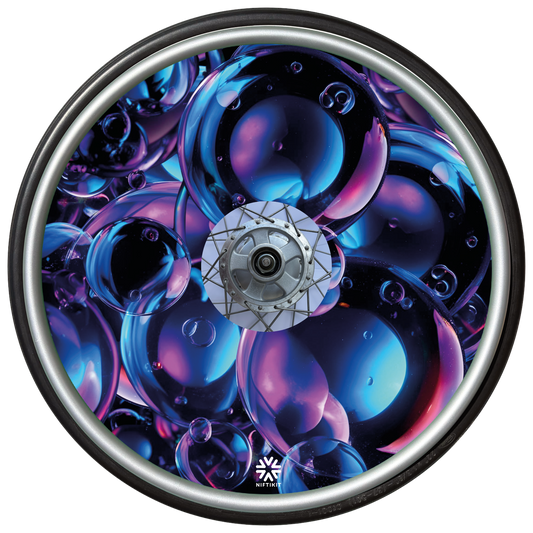 Decorative wheel cover with abstract blue and purple bubbles with small Niftikit logo in white. 