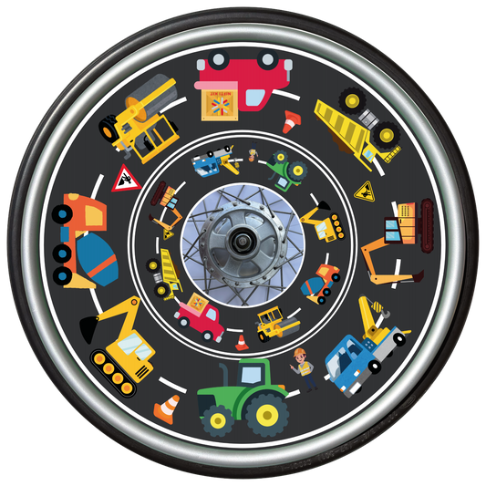 Wheelchair wheel with a colorful cover featuring tractors, diggers and  and trucks designs and road background. 