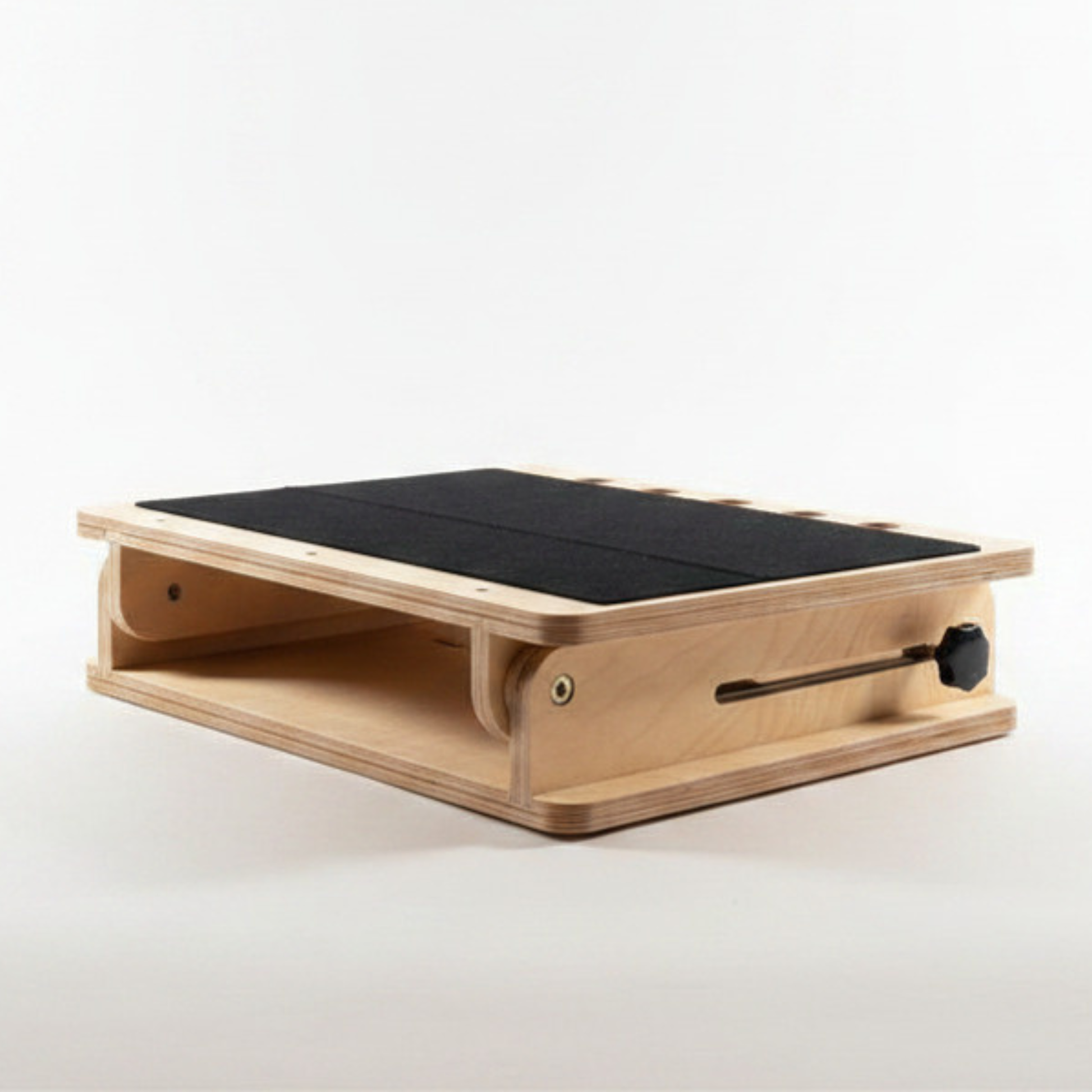 Ergonomic tilted accessible desk in flat , closed position for supporting books and devices at a 0 to 45-degree angle