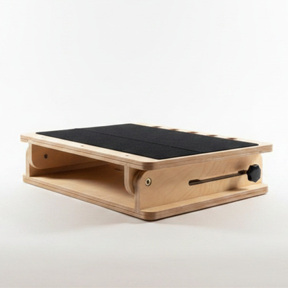 Ergonomic tilted accessible desk in flat , closed position for supporting books and devices at a 0 to 45-degree angle