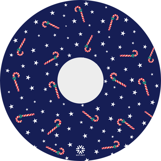 Wheelchair spoke guard with candy cane and star pattern on a blue background