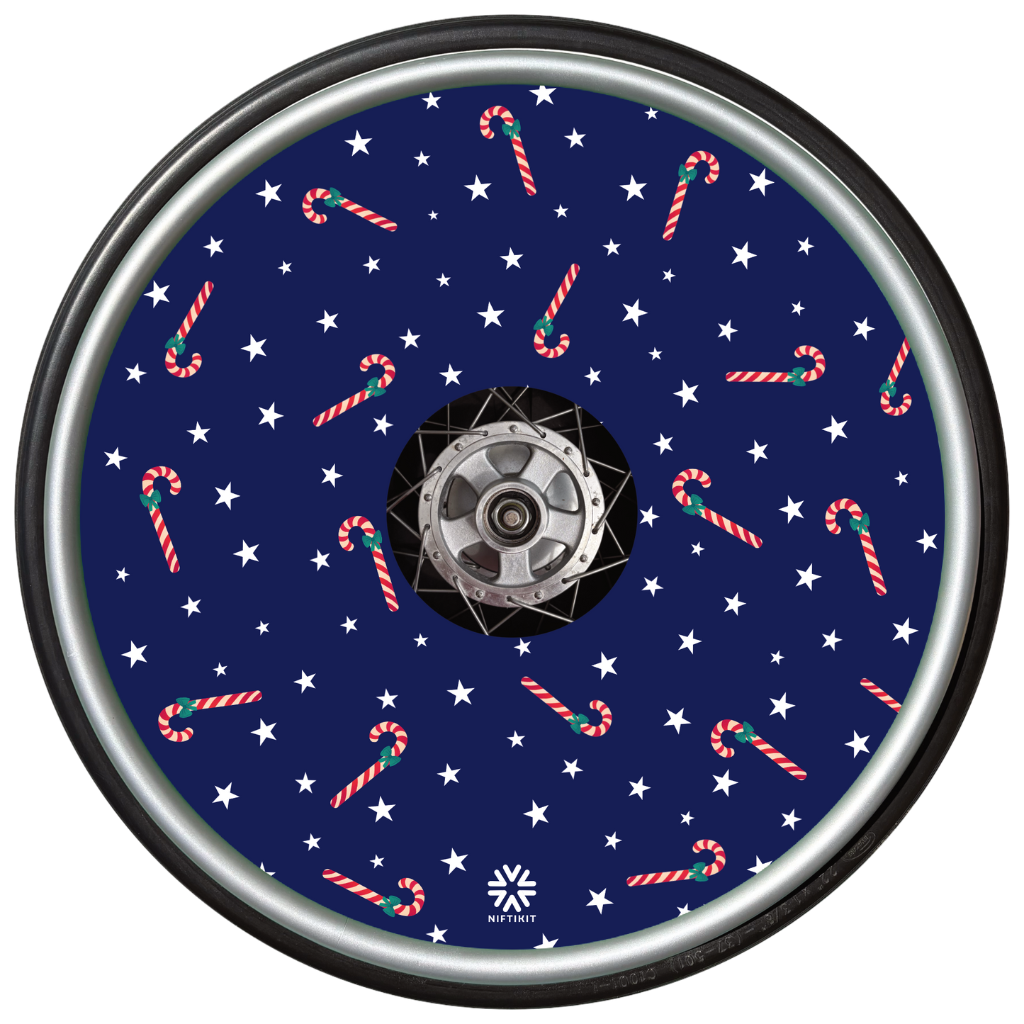 Decorative wheel cover with candy cane and star pattern on a blue background