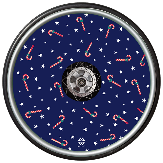 Decorative wheel cover with candy cane and star pattern on a blue background