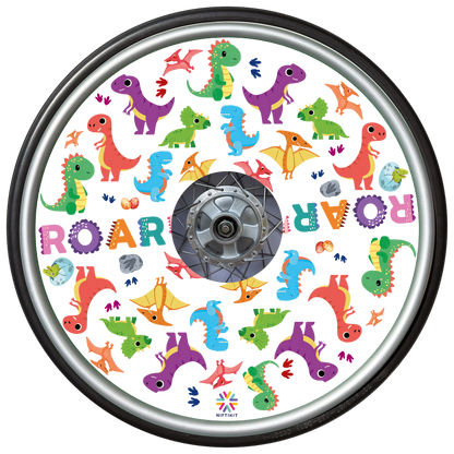 Wheelchair wheel featuring a wheel cover with colorful dinosaur pattern on a white background