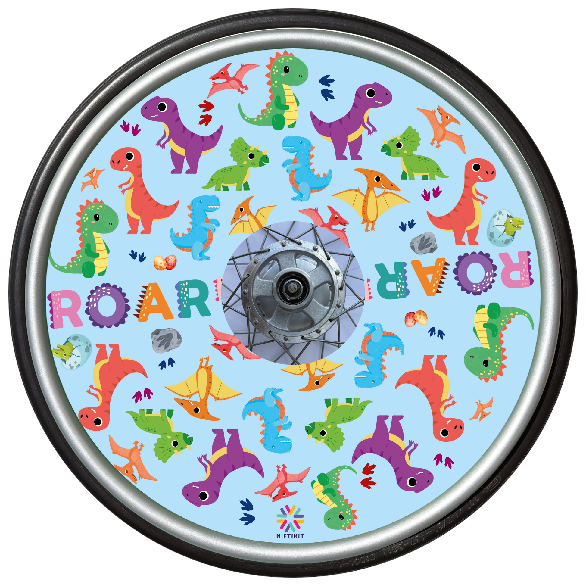 Wheelchair wheel featuring a wheel cover with colorful dinosaur pattern on a blue background