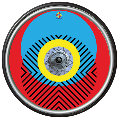 Wheelchair wheel with cover featuring bright geometric pattern including circles and lines. Red background with centre hub cutout and small Niftikit logo.