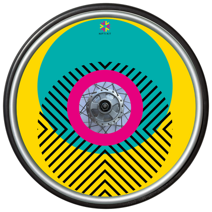 Wheelchair wheel with cover featuring bright geometric pattern including circles and lines. Yellow background with centre hub cutout and small Niftikit logo.