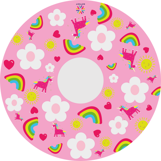 Wheelchair wheel cover with bright rainbows and unicorns on a baby pink background with cartoon white flowers. 