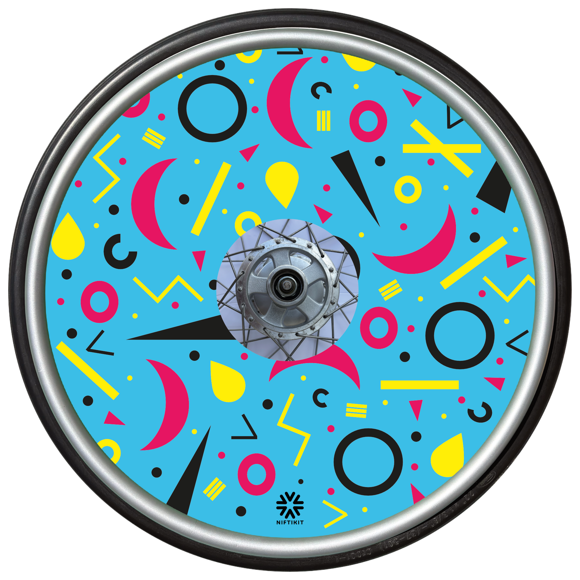 Wheelchair wheel cover with rings, lines  and moons patterns in pink, black, yellow. Centre hub cutout, small Niftikit label. blue background. 