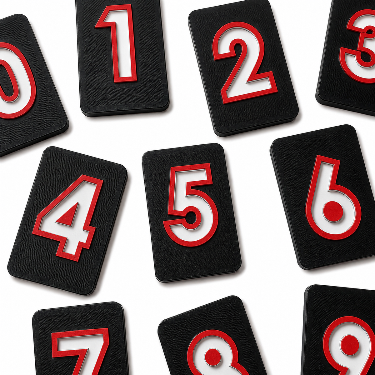 Nifti-Vision high contrast tactile number tiles showing numbers 0 to 9, designed to support tactile number recognition, counting, tracing and early maths learning for blind and partially sighted children.