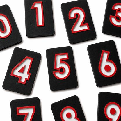 Nifti-Vision high contrast tactile number tiles showing numbers 0 to 9, designed to support tactile number recognition, counting, tracing and early maths learning for blind and partially sighted children.