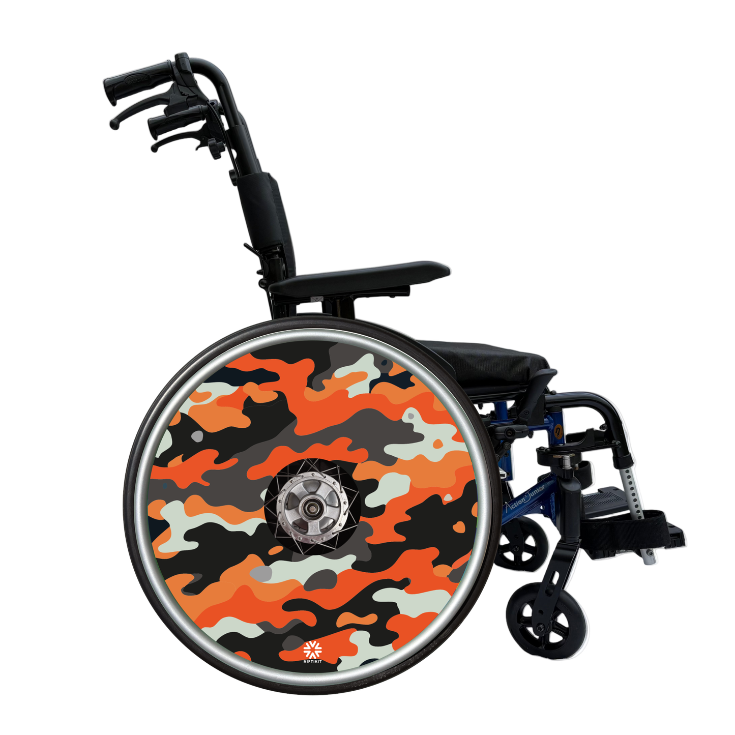 Orange camouflage wheelchair wheel cover installed on a manual wheelchair, showcasing a vibrant camo spoke guard accessory for wheelchair customisation and spoke protection.