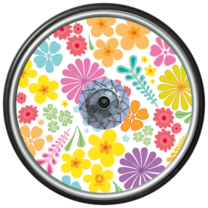 Wheelchair wheel cover with colorful floral pattern in pastel colours with centre hub cutout