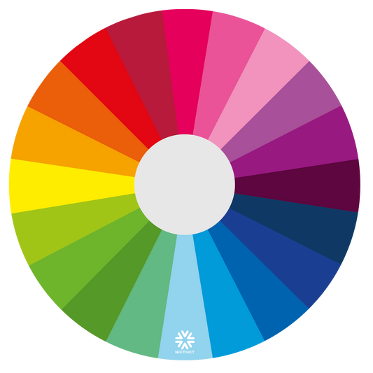 Wheelchair spoke guard cover with rainbow colour spectrum fanning out from the center in 20 colours. 