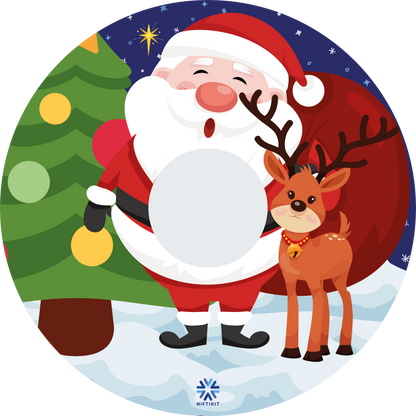 Festive wheelchair wheel cover featuring cartoon Santa Claus with a reindeer and Christmas tree on a snowy background