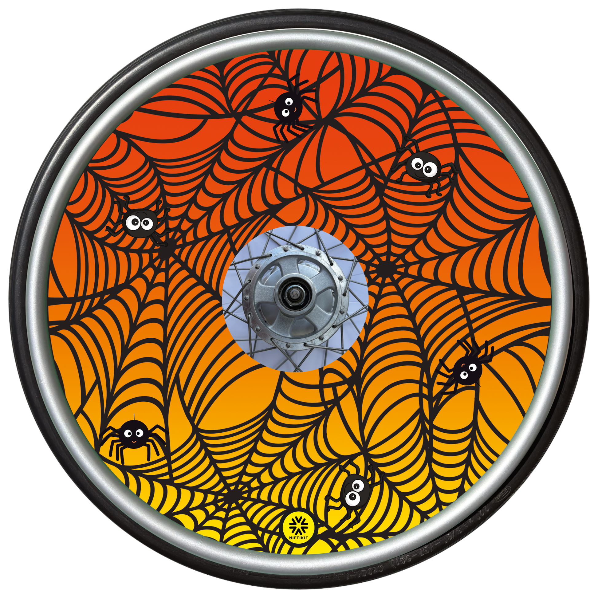 Wheelchair wheel cover on a wheel featuring spiders on spider webs on an orange background.