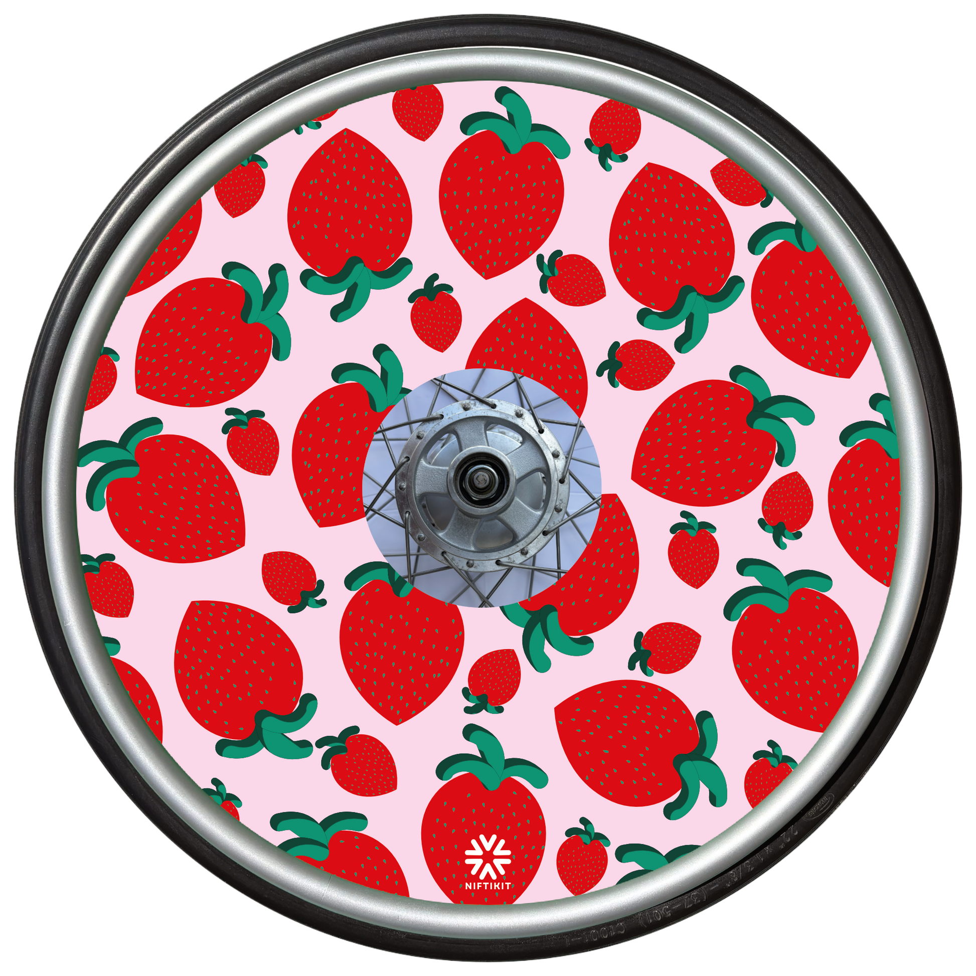 Wheelchair wheel with spoke cover with strawberry pattern on a pink background