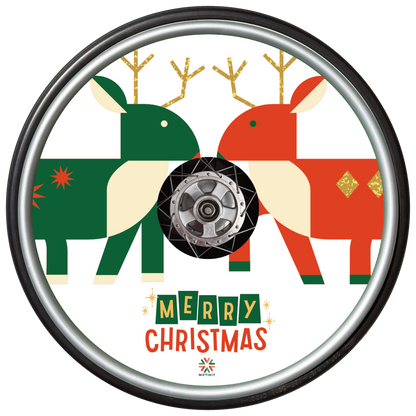 Wheelchair wheel with spoke guard featuring two abstract, blocky reindeer, facing each other and Happy Christmas statement below on white background