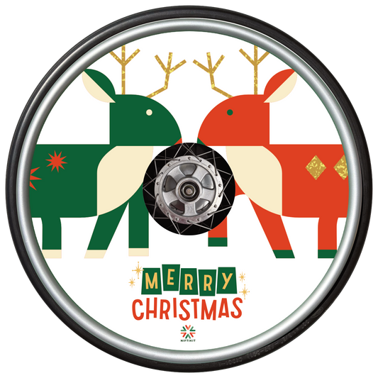 Wheelchair wheel with spoke guard featuring two abstract, blocky reindeer, facing each other and Happy Christmas statement below on white background