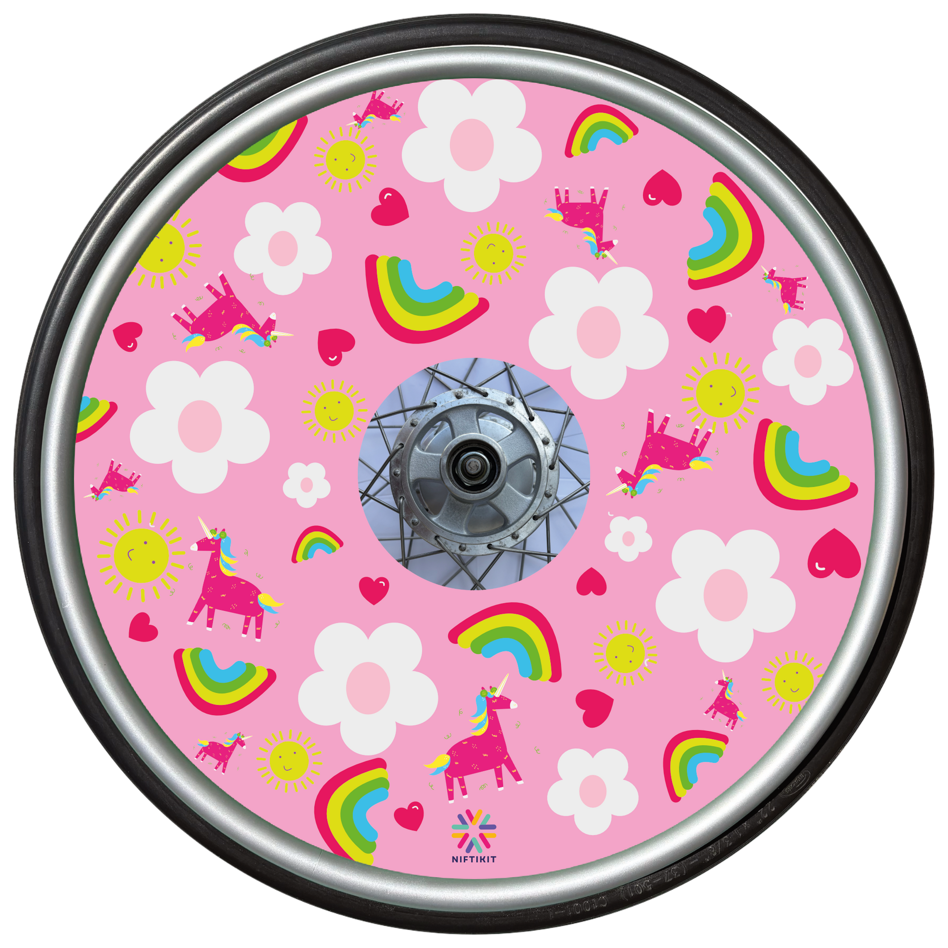 Wheelchair wheel cover with bright rainbows and unicorns on a baby pink background with cartoon white flowers. 
