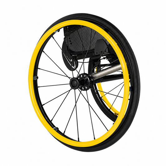 A close-up of a wheelchair wheel featuring a bright yellow push rim cover and black tire, with black spokes against a plain white background.