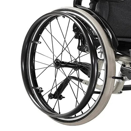 Wheelchair showing 24" bright black silicone hand rim cover.
