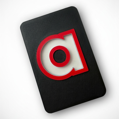 black letter tiles with 3D raised red/white letters for cortical visual impairment