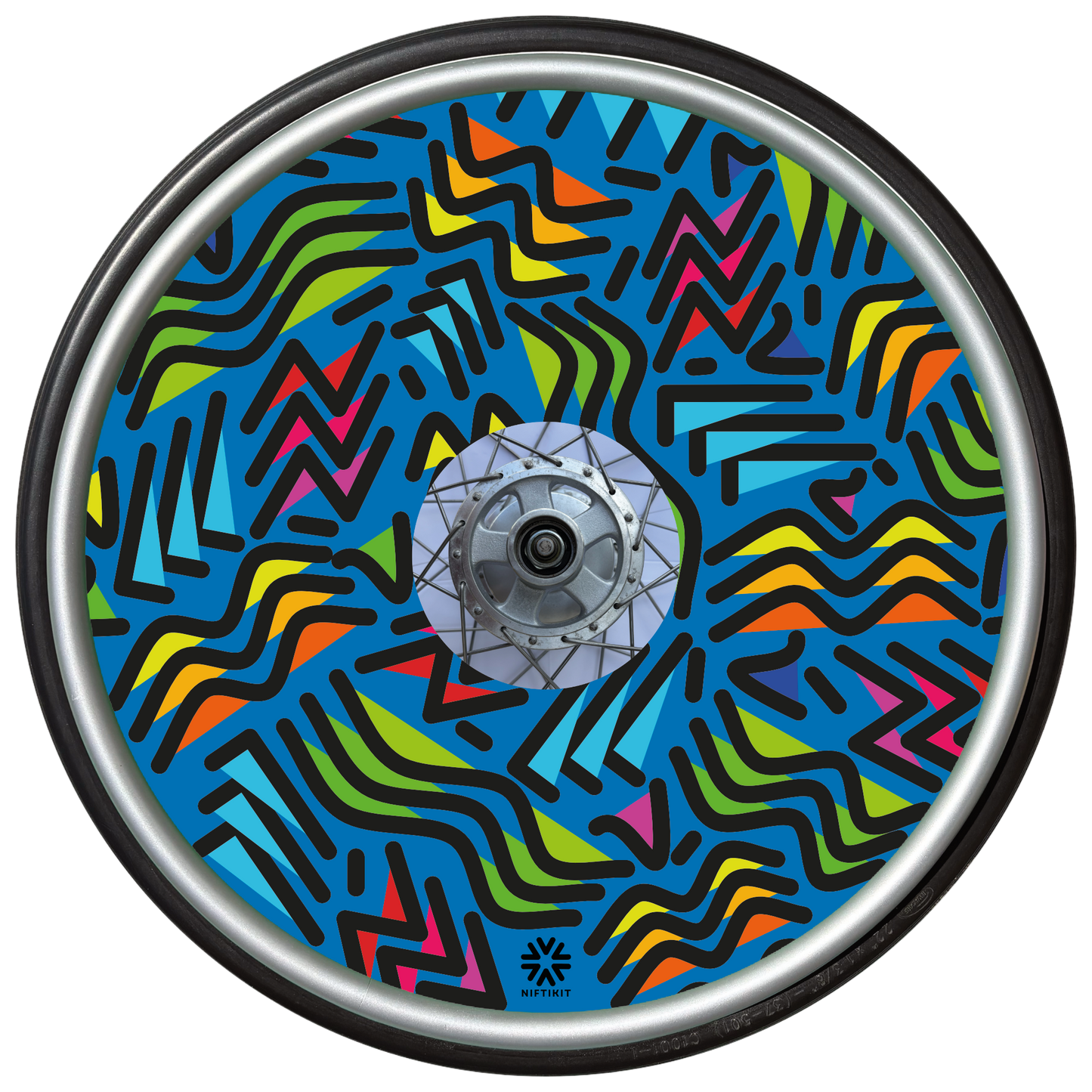 Wheelchair wheel with spoke guard featuring geometric lines of varying shapes and lengths on a blue background 