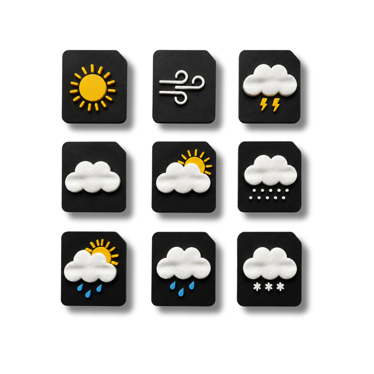 9 weather symbols arranged in a 3x3 grid. 3D tactile symbols include sun, wind, cloudy, storm, partially sunny, hail, sun and showers, rain, and snow. For partially sighted, CVI and visually impaired sensory learning 