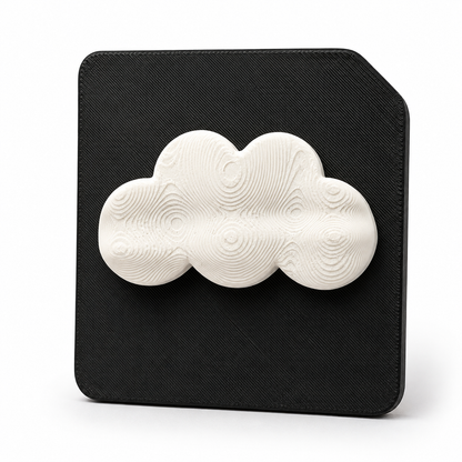 A 3D tactile cloud weather symbol on black high contrast tile. Showing a raised cloud for sensory learning tactile discrimination for blind and visually impaired 