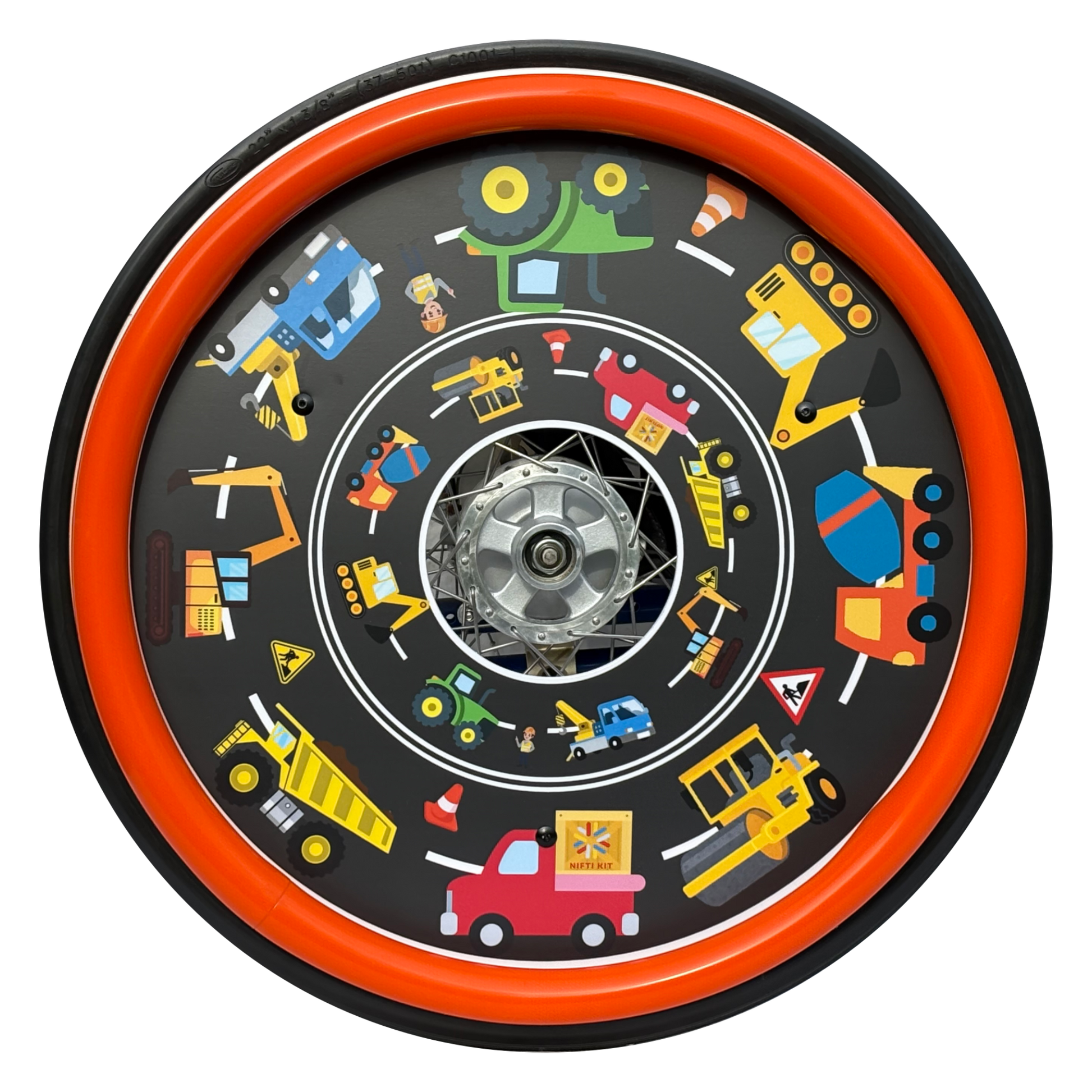 Wheelchair wheel featuring a orange silicone hand rim cover and spoke guard with colourful diggers, dumper trucks and tractors on a road background 