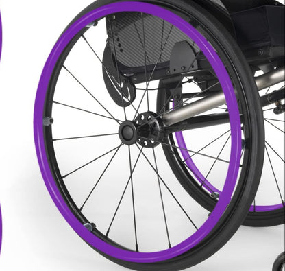 Wheelchair showing 24" bright purple push rim cover.