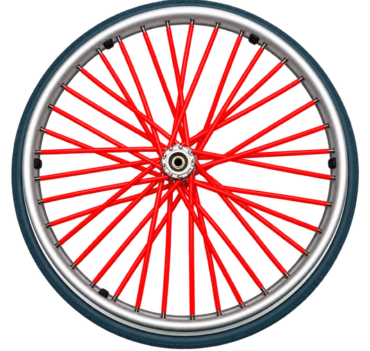 Red wheelchair spoke covers fitted to the spokes of a wheelchair wheel.